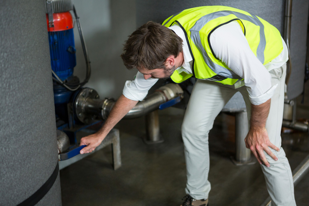 Plumber checking water meter movement to leak Detection in Redfern