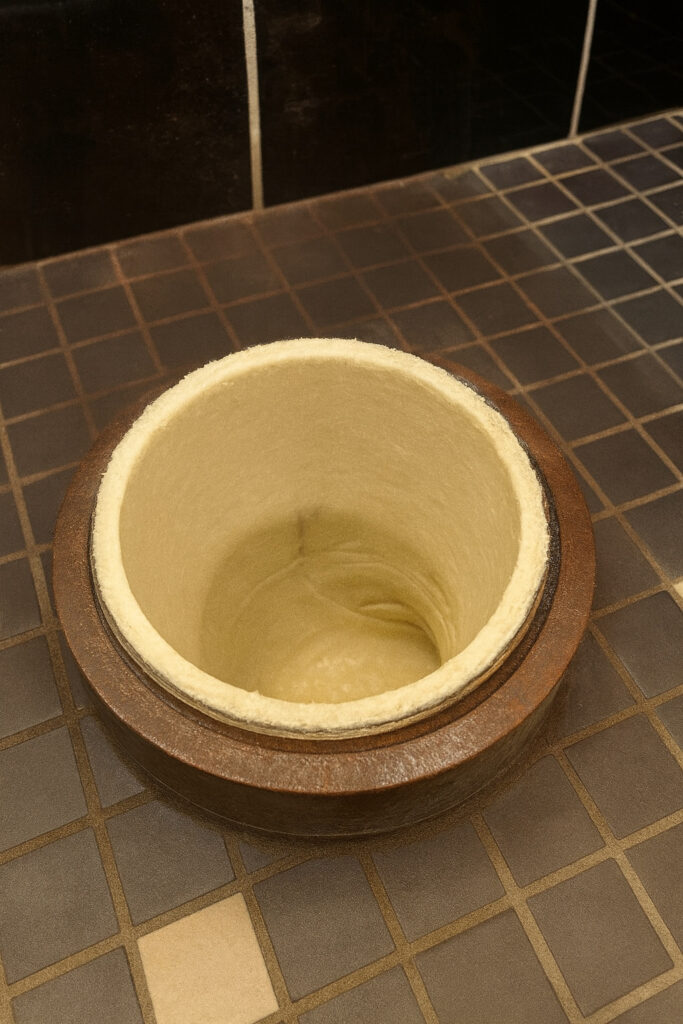 Clean close-up view of a relined pipe in a Redfern property showing the smooth cured-in-place liner